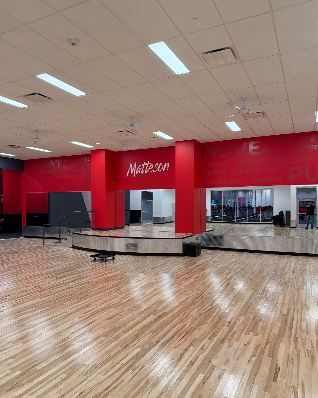 Hardwood group fitness floor with red walls at VASA Fitness Matteson